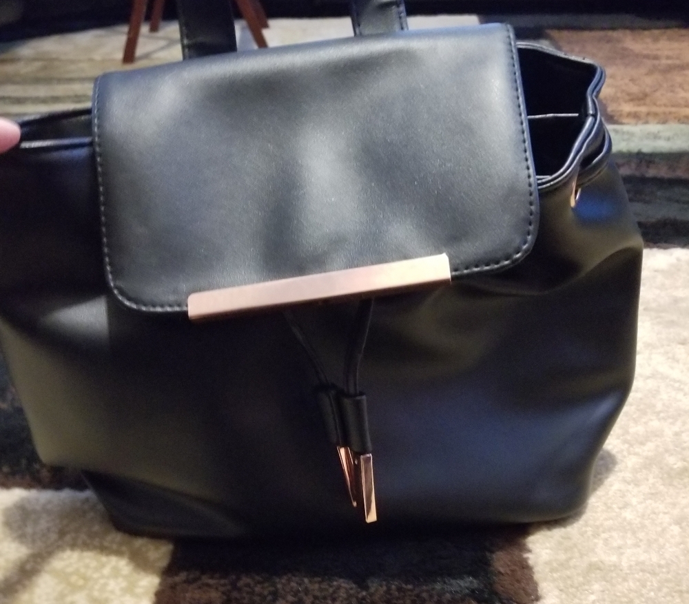 Black and rose gold mini backpack